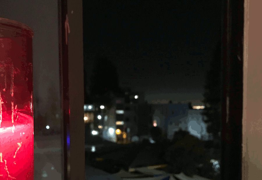 Candle in windowsill of a Rochdale apartment